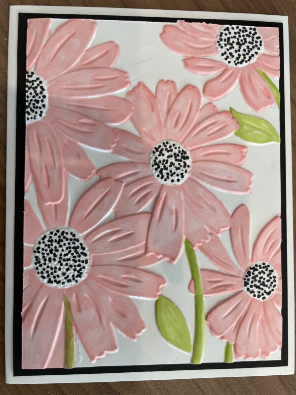 Card with pink flowers embossed on