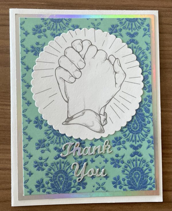 Thank you card with two hands clasped