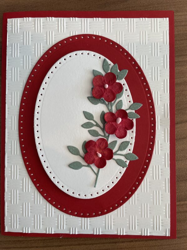 White card with red flowers
