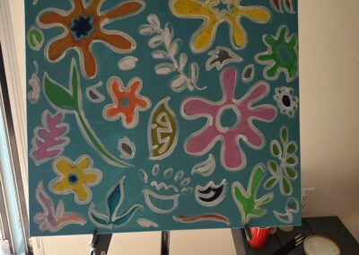 Painting of flowers on blue background